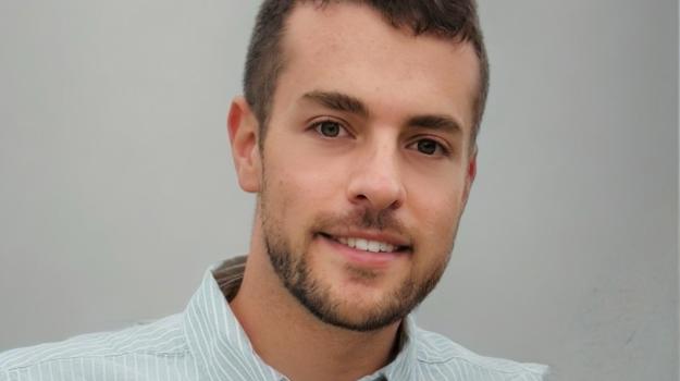 a person smiling for a picture
