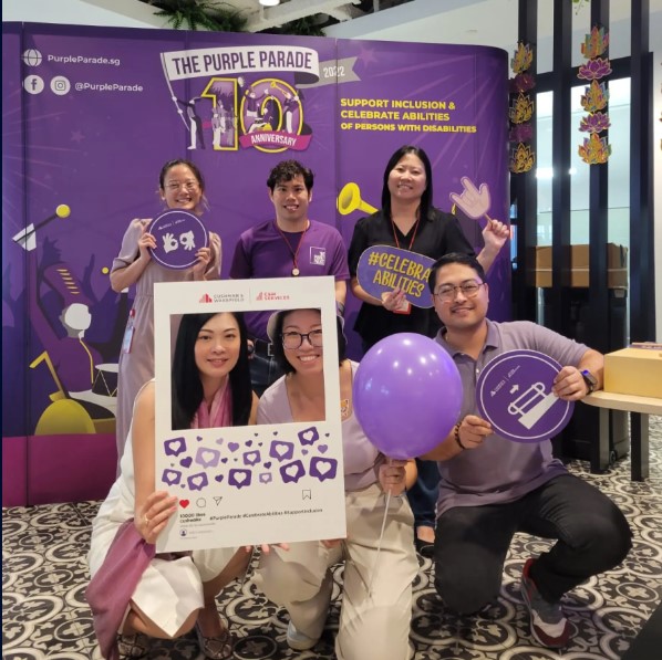 a group of people posing for a photo