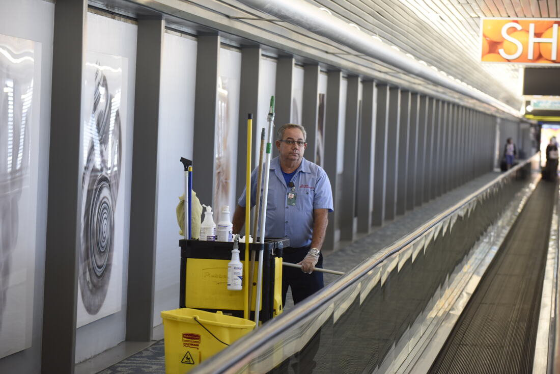 3Rd Lite CW CW Services Photo Shoots Miami Airport Man Cleaning Walkway MIA 1004