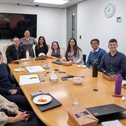 a group of people around a table