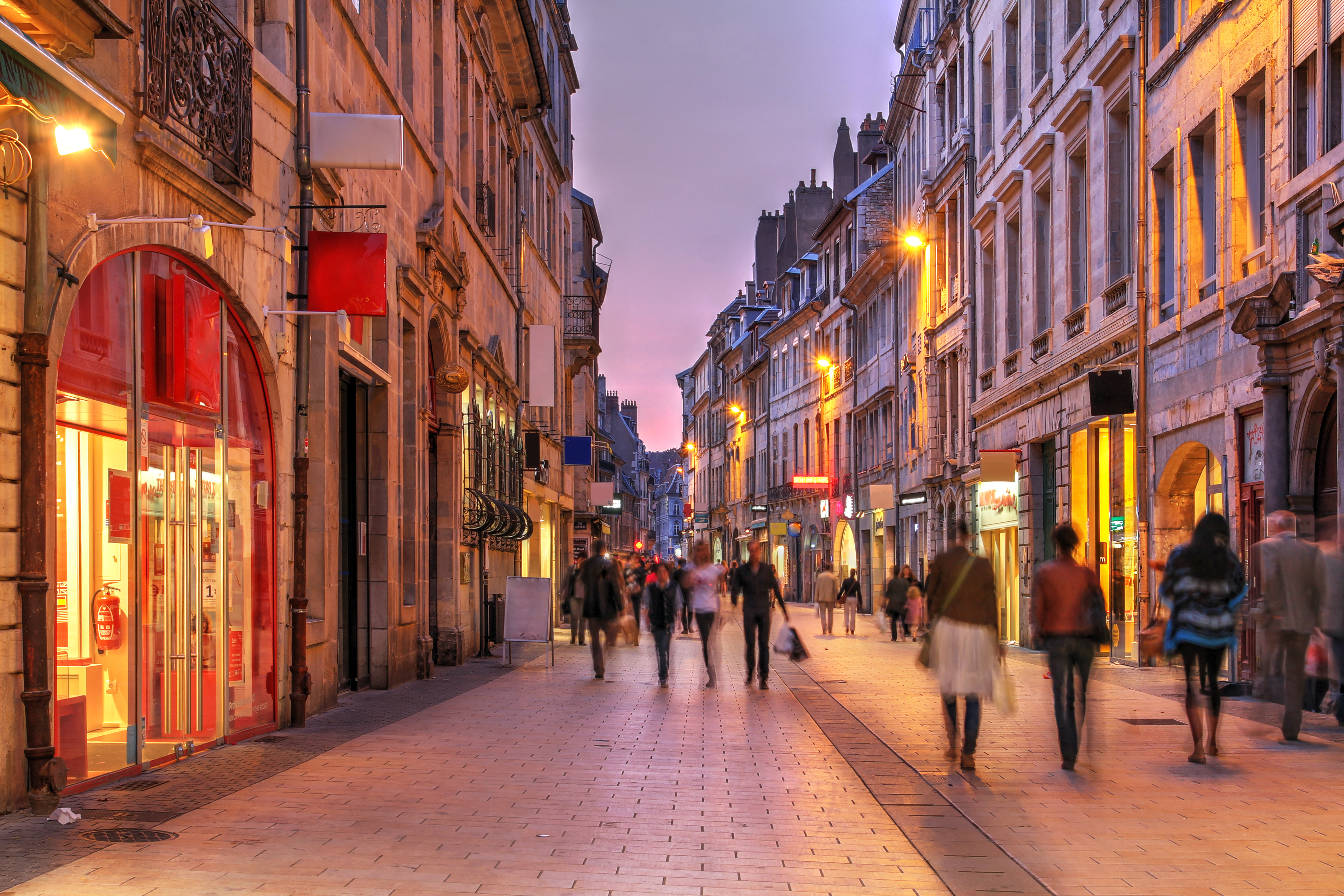 people walking on a street