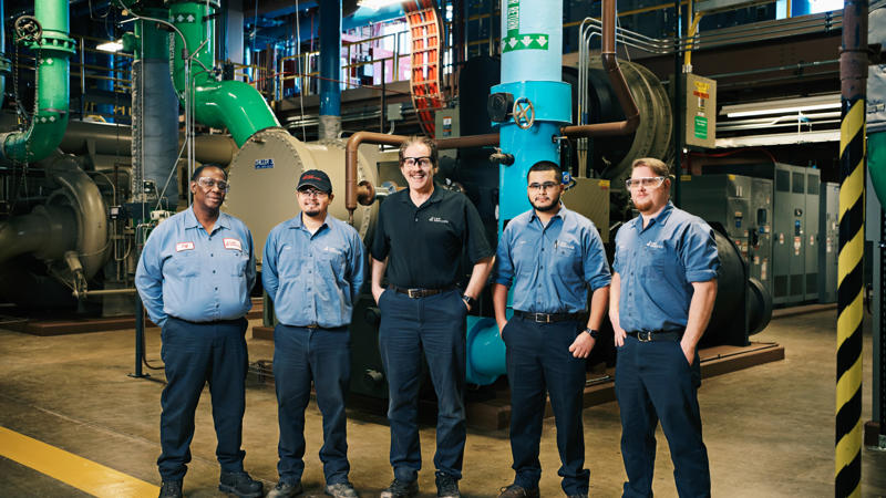 a group of men in a factory