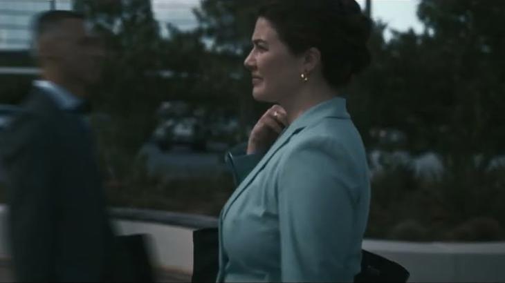 a person in a blue suit