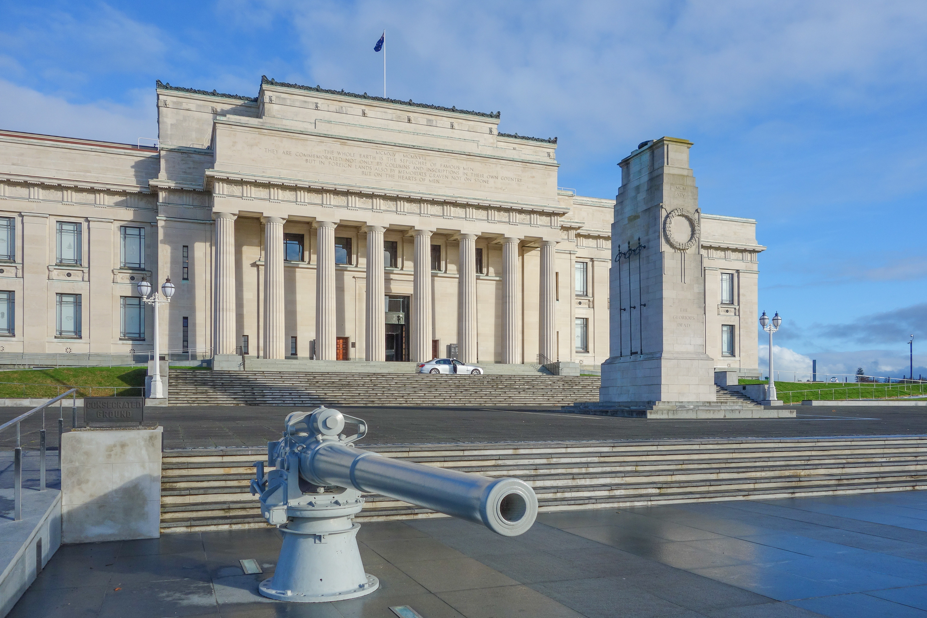 a cannon in front of Auckland War Memorial Museum