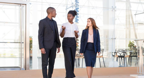 a group of people standing on a glass floor