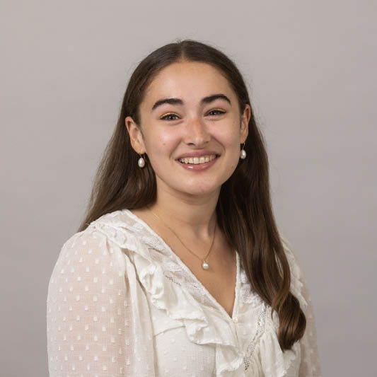 a person smiling at camera