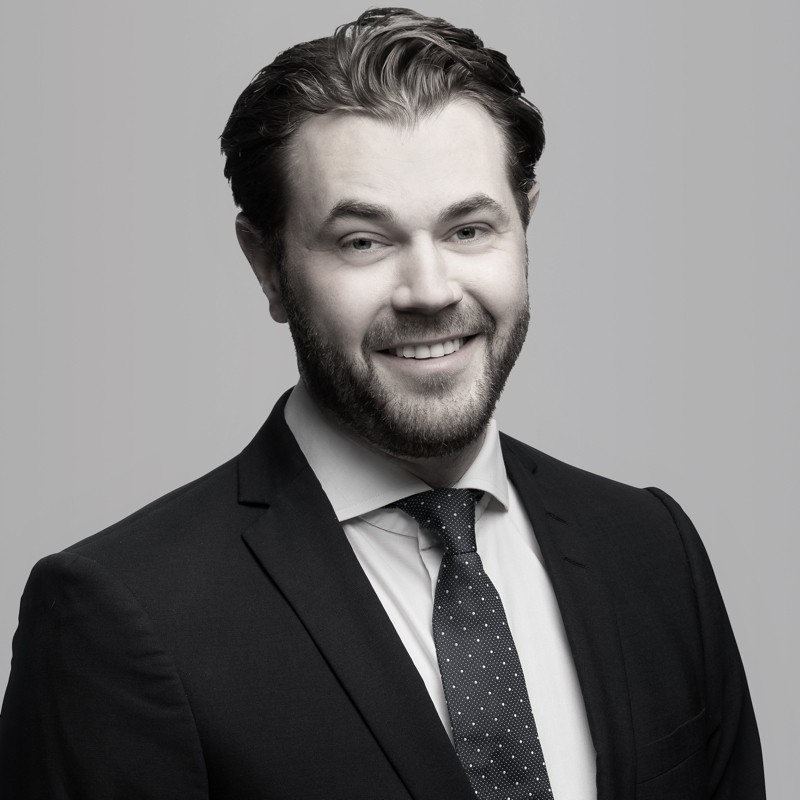a person in a suit and tie