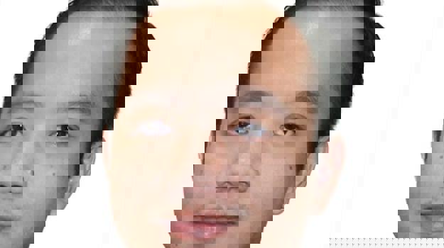 a person in a suit and tie