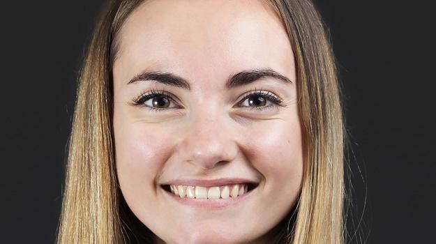 a person smiling at the camera