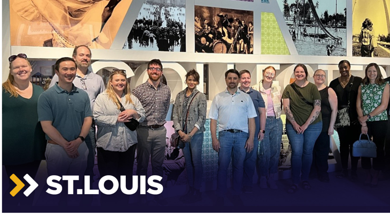 a group of people posing for a photo