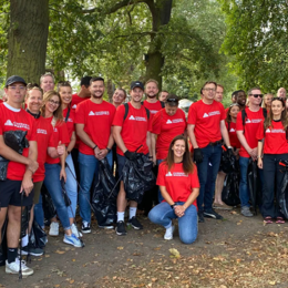 a group of people in red shirts