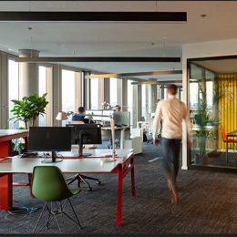 a person walking in an office