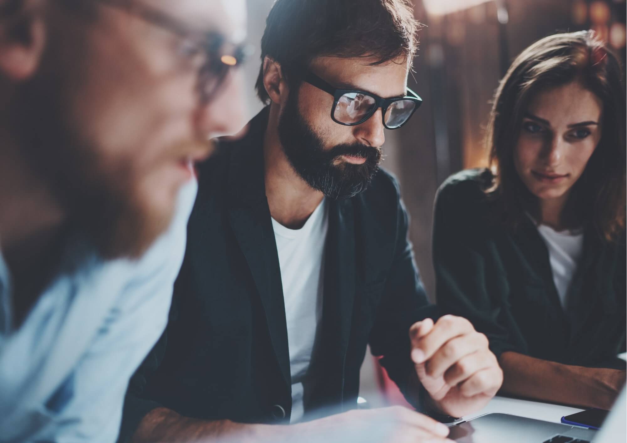 3 People Looking At Screen