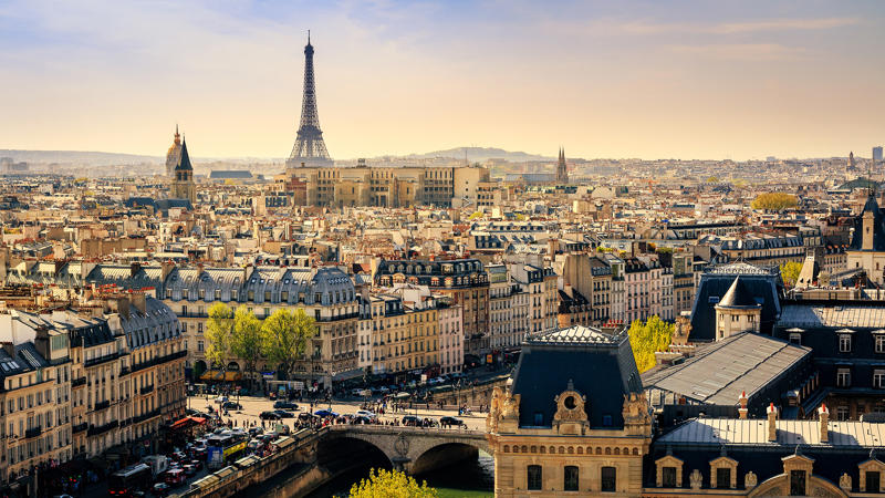 a city with a bridge and a tower