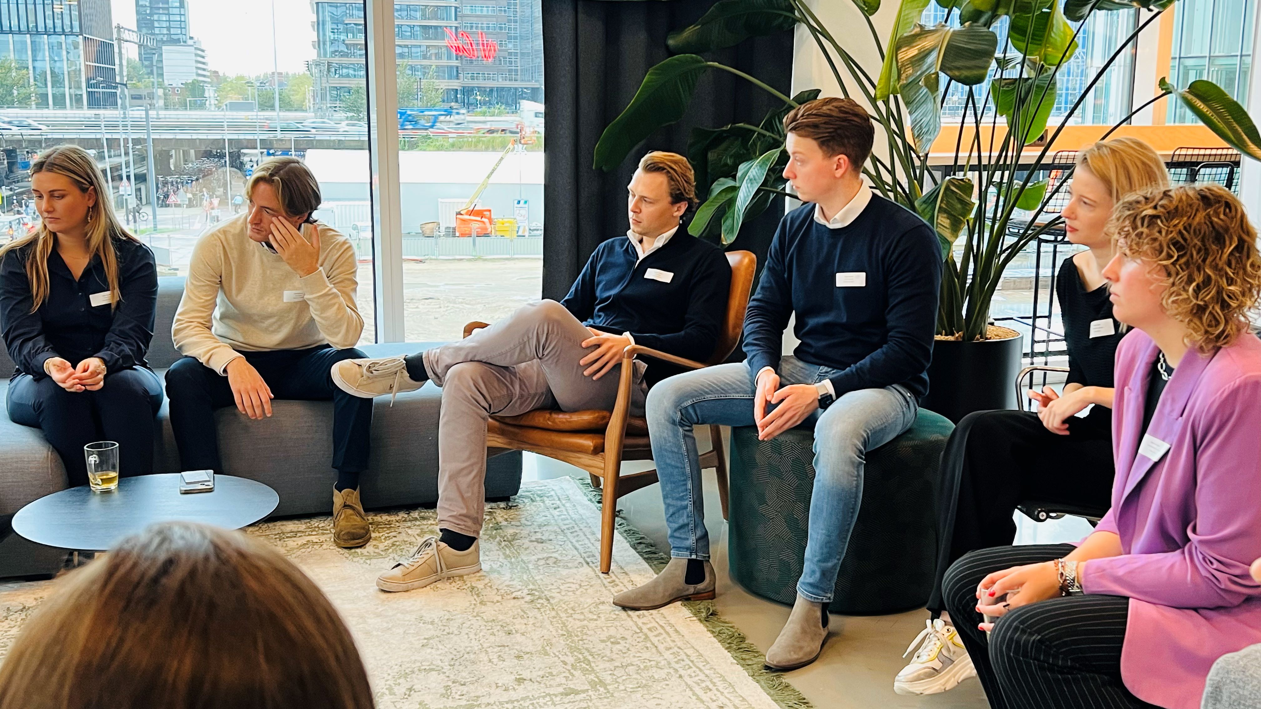 a group of people sitting in chairs