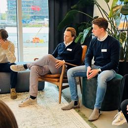 a group of people sitting in chairs