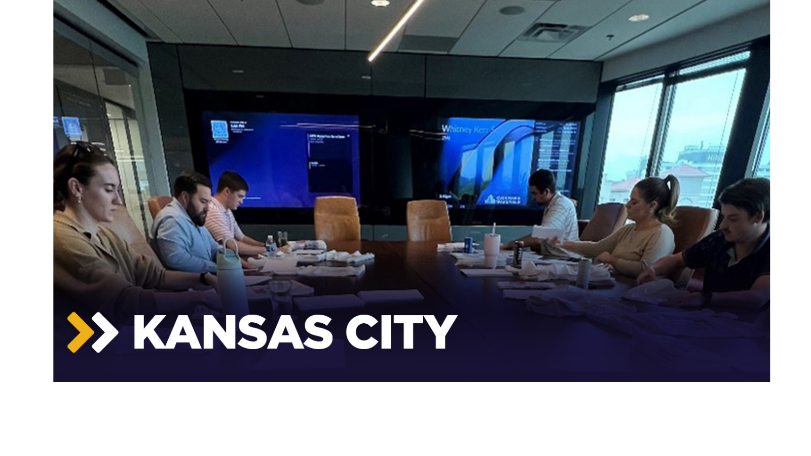 a group of people sitting at a table