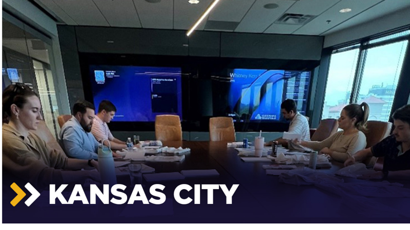 a group of people sitting at a table