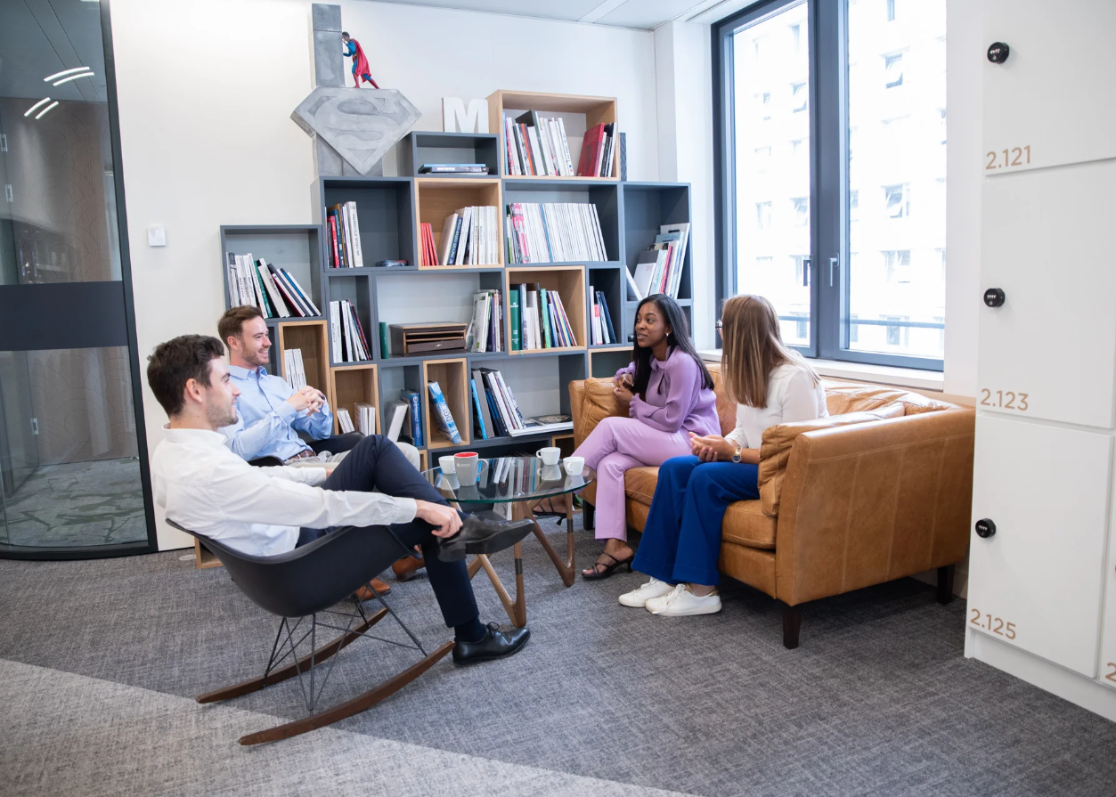 a group of people sitting in a room