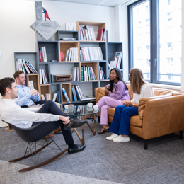 a group of people sitting in a room