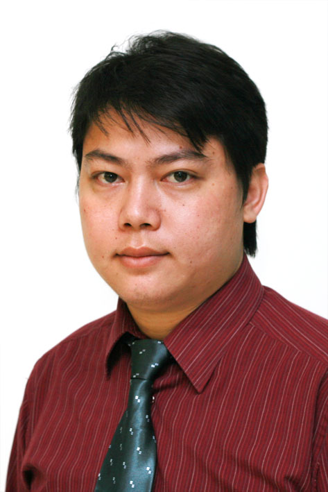 a person in a red shirt and tie