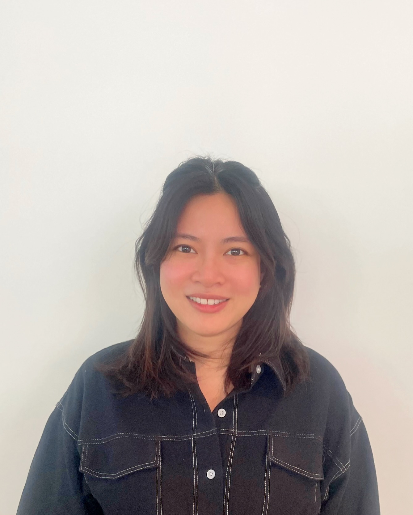 Una persona sonriendo a la cámara