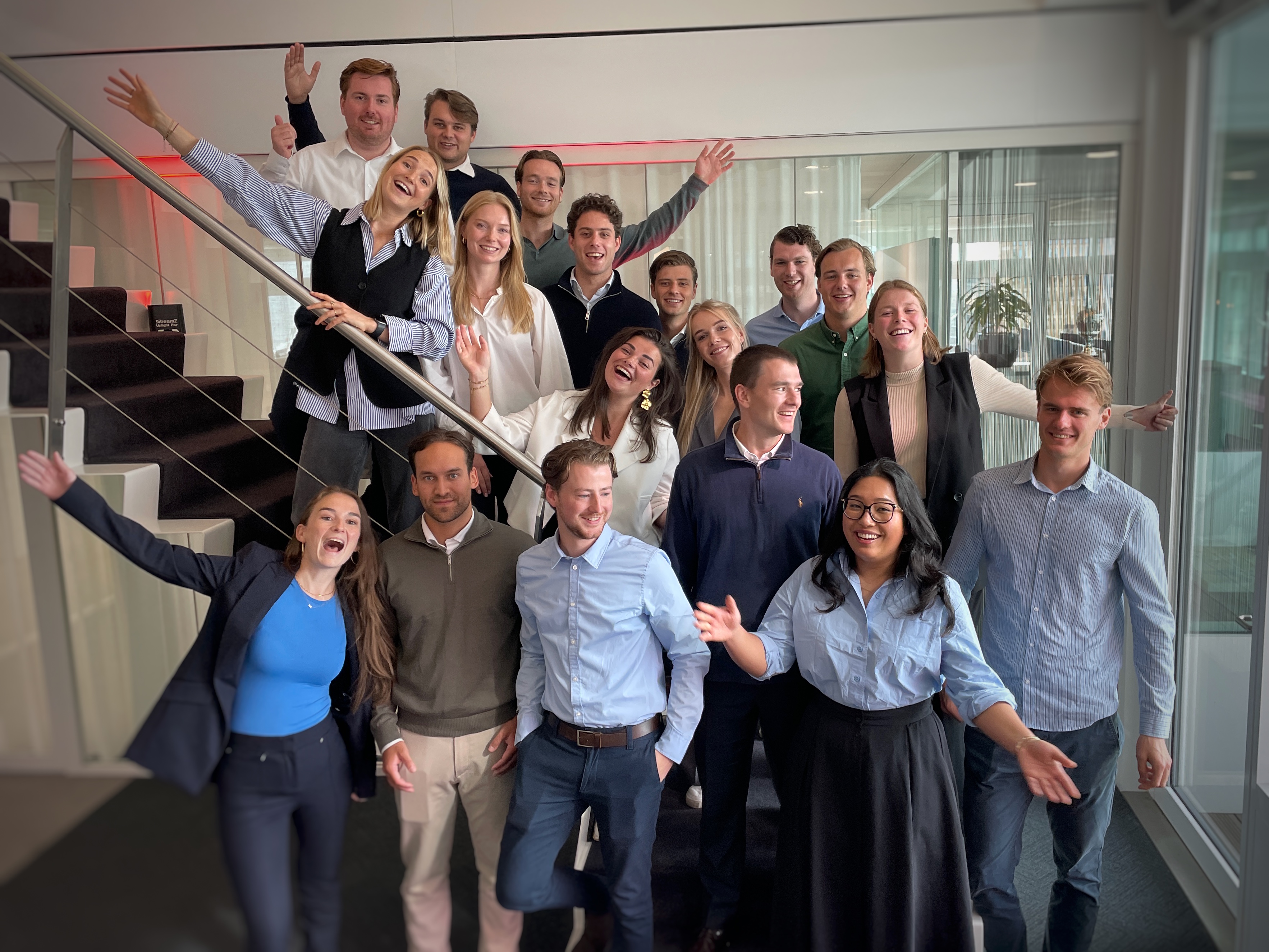 a group of people posing for a photo