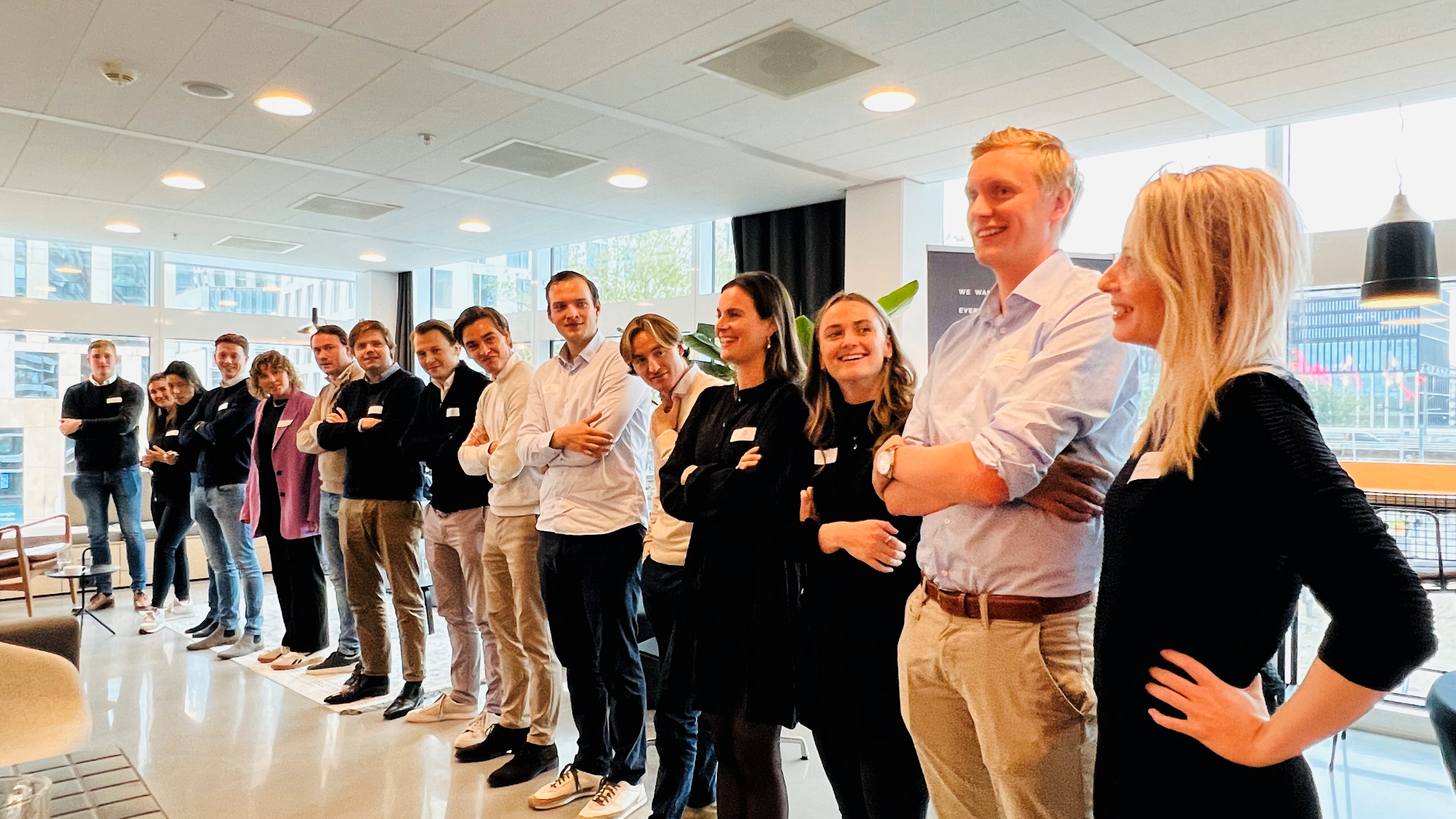 a group of people standing in a line