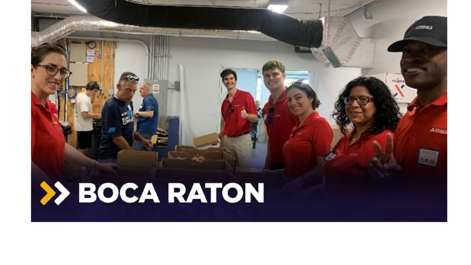 a group of people standing in a room