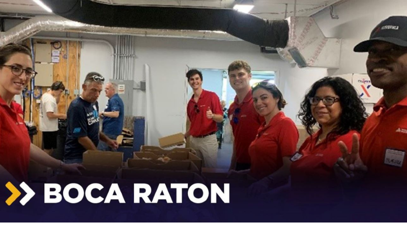 a group of people standing in a room