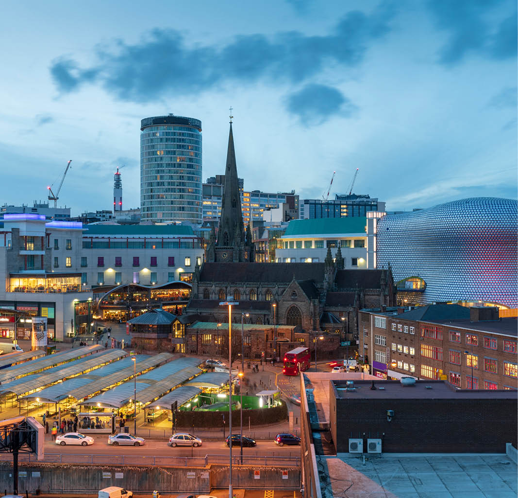 a city with buildings and cars