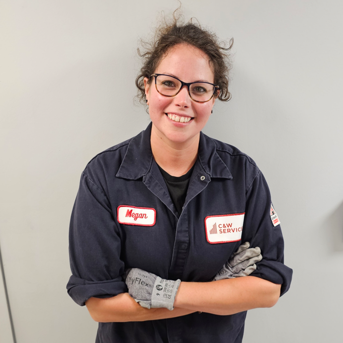 a person wearing glasses and a uniform
