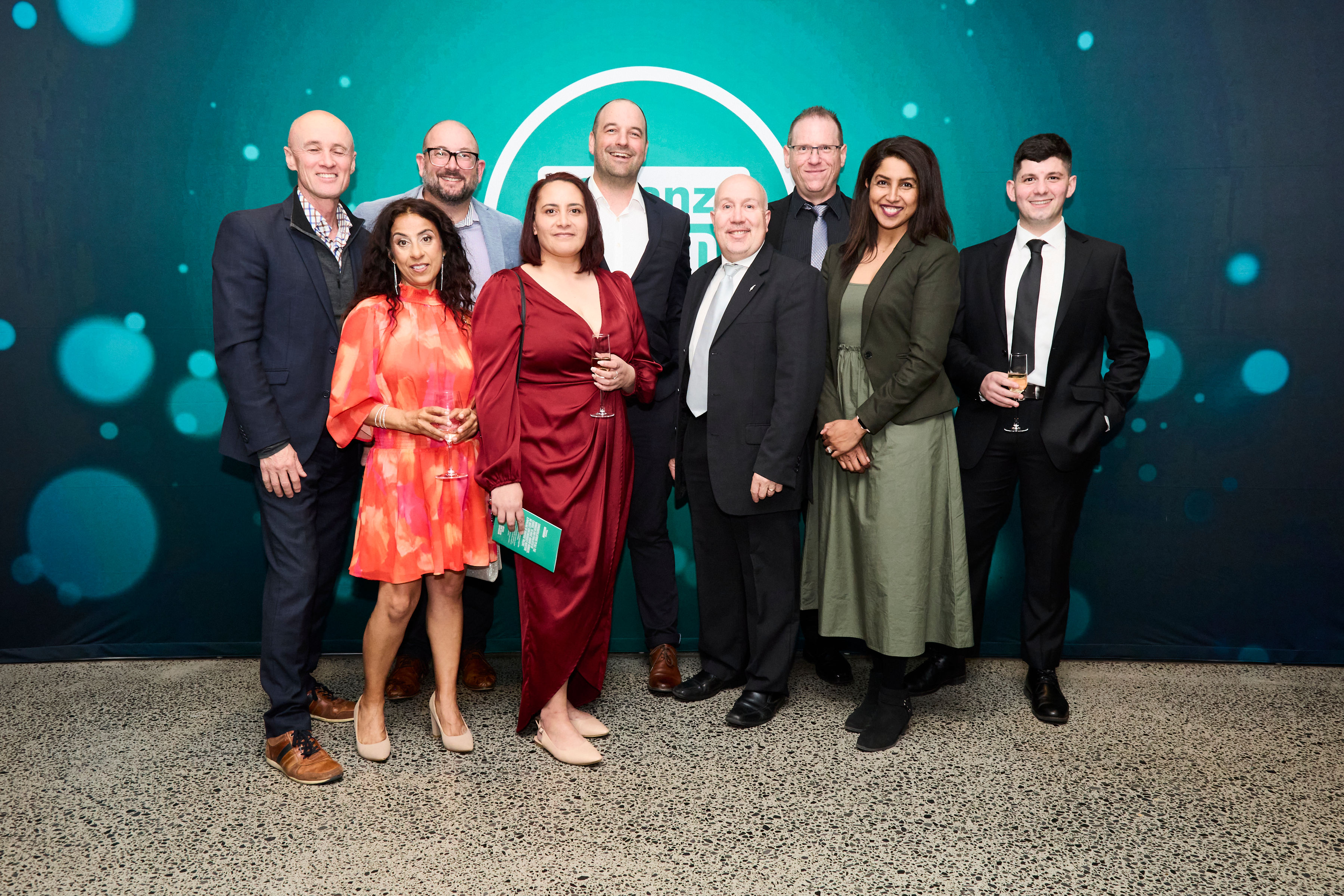 a group of people posing for a photo