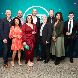 a group of people posing for a photo