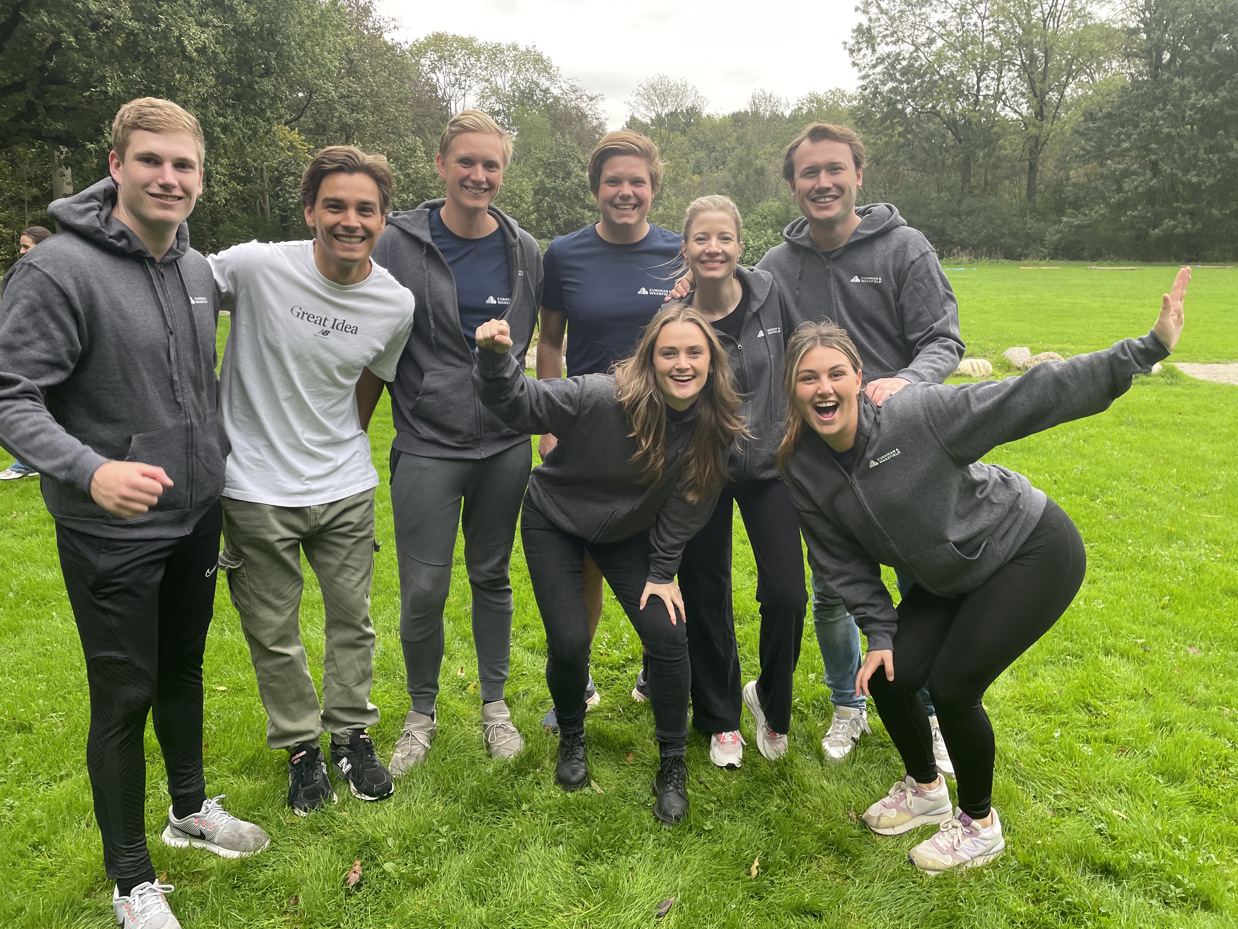 a group of people posing for a photo