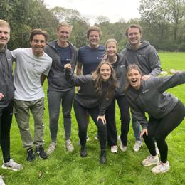 a group of people posing for a photo