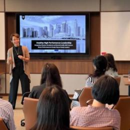 a person giving a presentation to a group of people