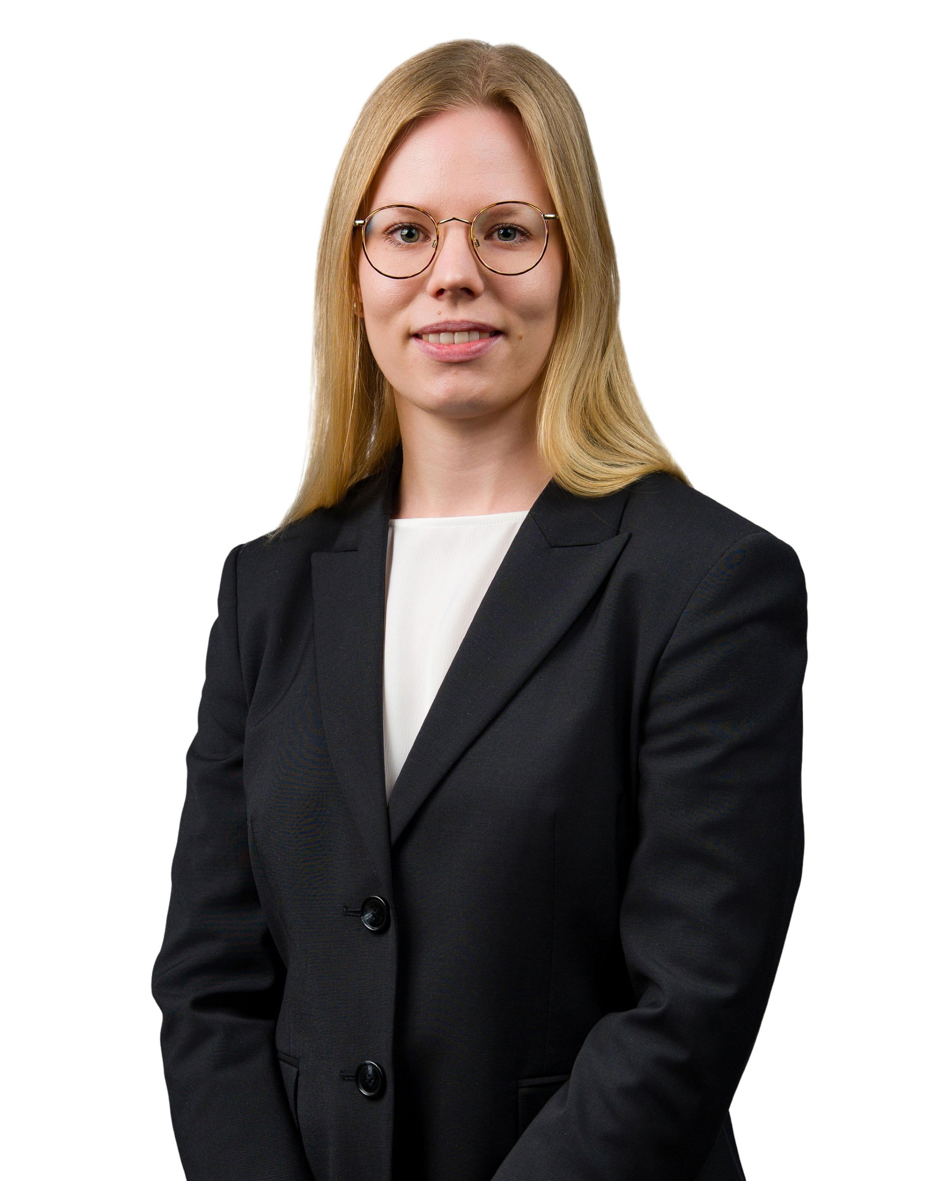 a person wearing glasses and a suit