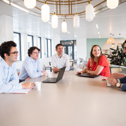 a group of people around a table